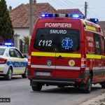 Ambulanță SMURD și mașină de poliție pe stradă