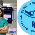 Medic în uniforme verzi lângă sigla clinicii județene de urgență
